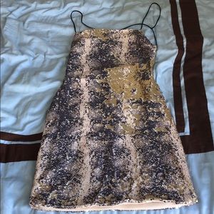 Sparkling mini dress .
